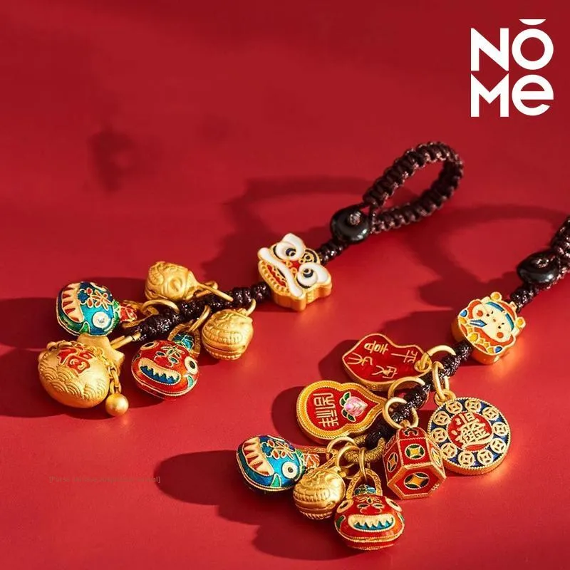 NOME Keychains Unisex-2