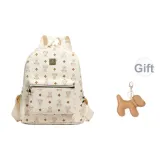 Ecru Printer Ribbons Puppy Pendant