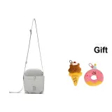 Comes with Limited Edition Bag Charm