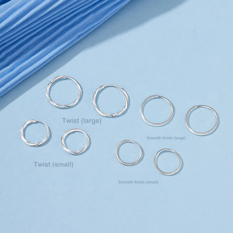 Lao Feng Xiang S999 Fine Silver Pair Of Stud Earrings Unisex-1